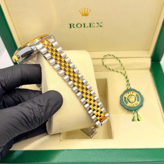 Rolex land dweller truetone with green dial